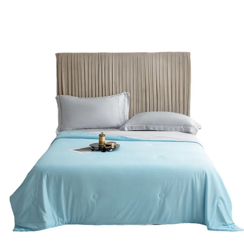 The Sky Blue cooling doona on a queen bed, front view